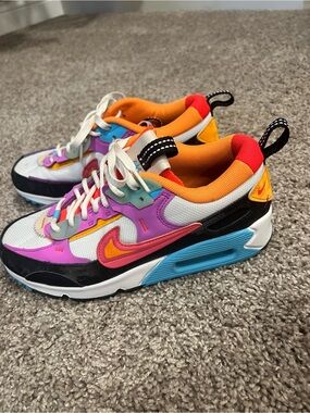 Nike Women's Multicolor Sneakers with Orange, Pink & Blue Accents